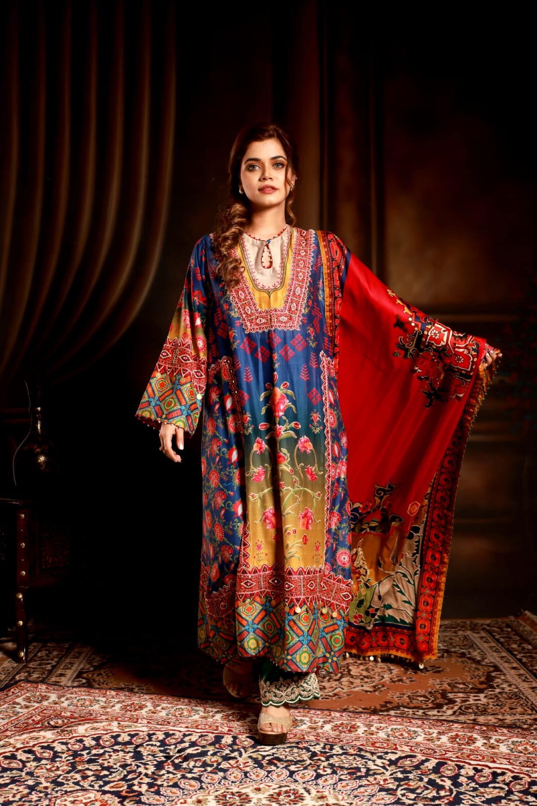 Blue floral suit with mortif and satin red dupatta & yellow pant .