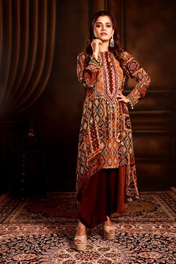 Wine color heavy neck front short back long kurta with coul pant.