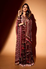 Wine color sharara with pink mirror dupatta.